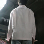 Model wearing the PVTLTD* Keep Your Hands Off Me Shirt, back view, size S