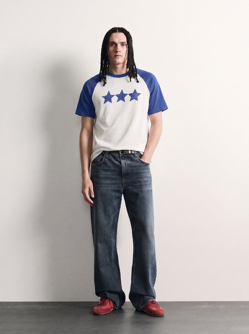 PVTLTD* Blue Raglan Tee, men's off-white tee with royal blue raglan sleeves, front on model