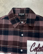 Close-up of the collar, PVTLTD* neck label and buttons on the Cosmic Flannel
