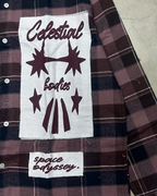 Close-up of the raw-edge Celestial Bodies and space odyssey patches, PVTLTD* Cosmic Flannel