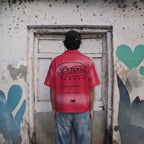 Model wearing the PVTLTD* Legacy Shirt, back view showing the Bombay Collective print