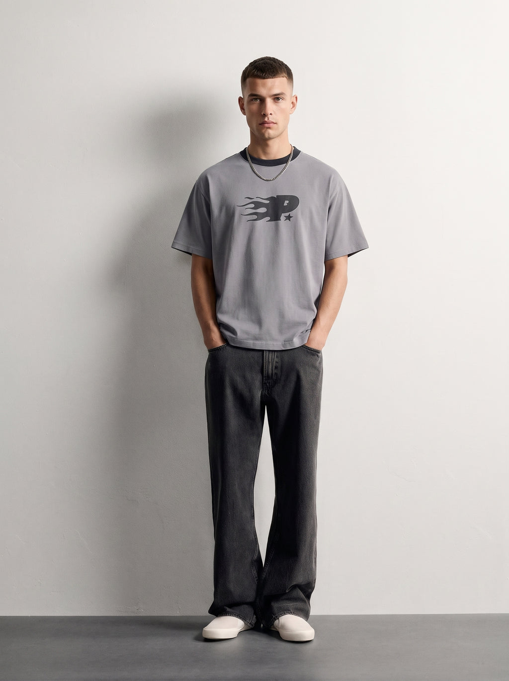 PVTLTD* Mansion Tee, men's ice grey boxy tee with black contrast collar, front on model