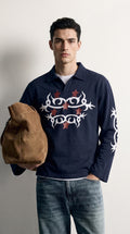 PVTLTD* Navy Legacy Polo, navy pique full sleeve polo with white tribal chest print, on model