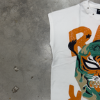 PVTLTD* White Raw Power Vest on concrete, showing the sleeveless armhole